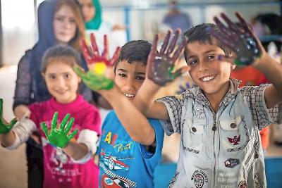 Kinderen tijdens een sessie van The Red Pencil voor migranten in Koerdisch gebied in Irak. © The Red Pencil